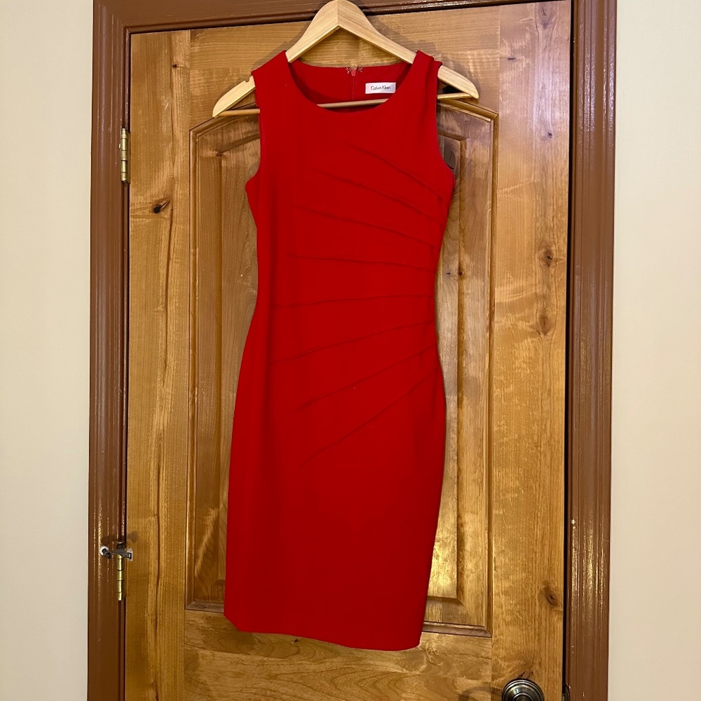 Calvin Klein red sunburst cocktail dress